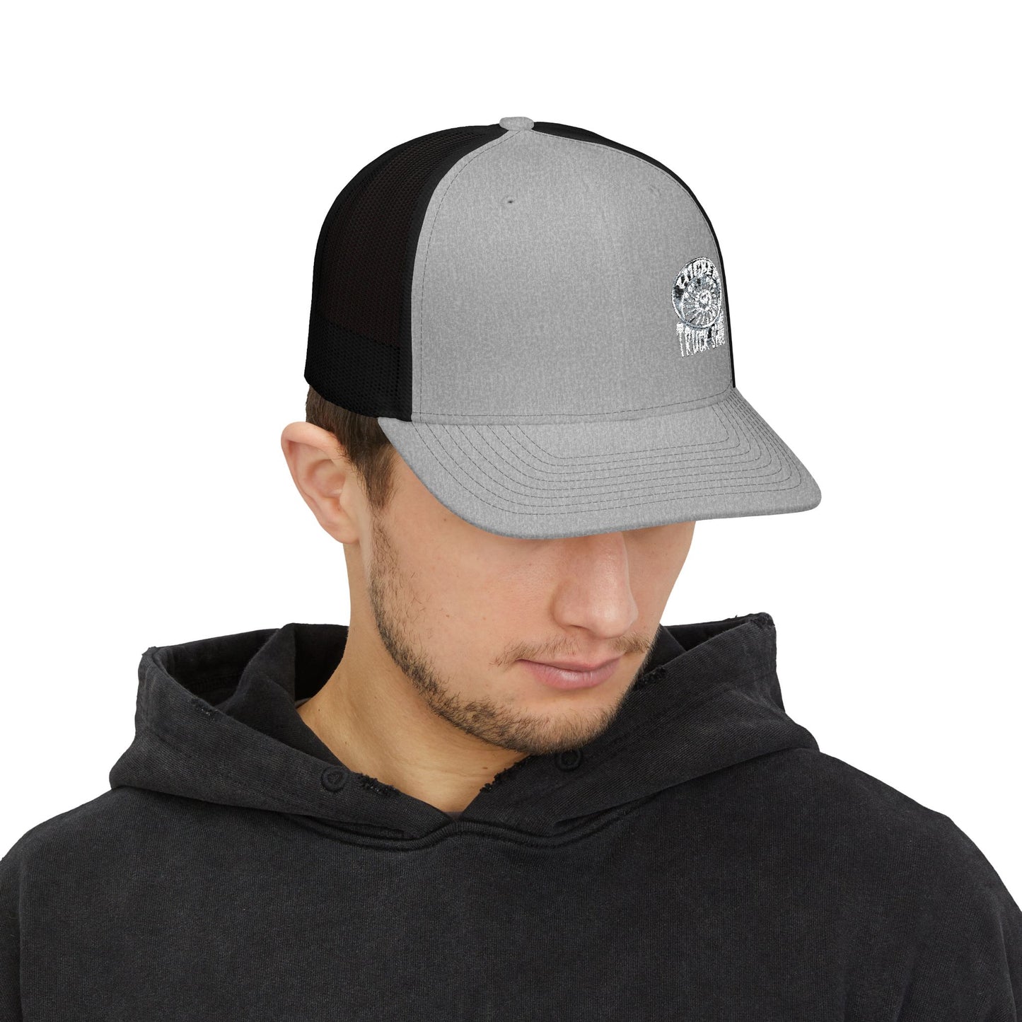 Embroidered Trucker Cap — Nautical Ammonite Skull Design